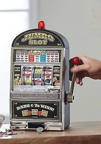 Lucky Sevens Jumbo Slot Machine Bank Replica     Realistic game play with Working handle and Wide spinning reels 