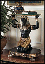 faithful Egyptian servant kneels and raises his muscular arms to serve in this artistic synergy of style and function waiting to be admired from all angles. Our Toscano exclusive, cast in quality designer resin and hand-painted in the rich tones of the Egyptian palette, is exquisitely displayed beneath. Unique egyptian themed furniture. 