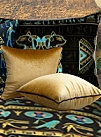 Gold throw pillows Egyptian bedroom decor