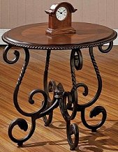 Bring the unique look of "Old World" style into your home with the elegant Crowley collection. Adding the rustic, rich look of timeless Spanish and Mediterranean style to your decor. Richly accented, pieces of the Crowley collection are heavily detailed with carved accents, scalloped edge and feet with a beautiful inlayed design on top