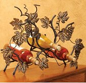 grapes wine decor - three bottle wine rack is perfect for your countertop or shelf. bottom four legs have rubber tips to prevent scratching of your surface. this popular design can compliment any dcor with the classic look of hand painted antique gold grapes, leaves and vines. 