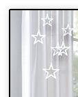 White sheer curtains   star string lights   