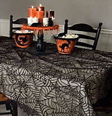 Set a scary table with our spider web lace table lines. Mix and match pieces to create a perfectly frightful scene, halloween decorations.