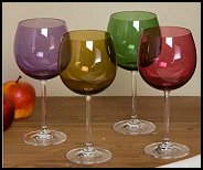Tuscan kitchen decor. Add some color to your table setting with this set of Tuscany Harvest balloon glasses. This Lenox barware comes in a set of four glasses in assorted colors.